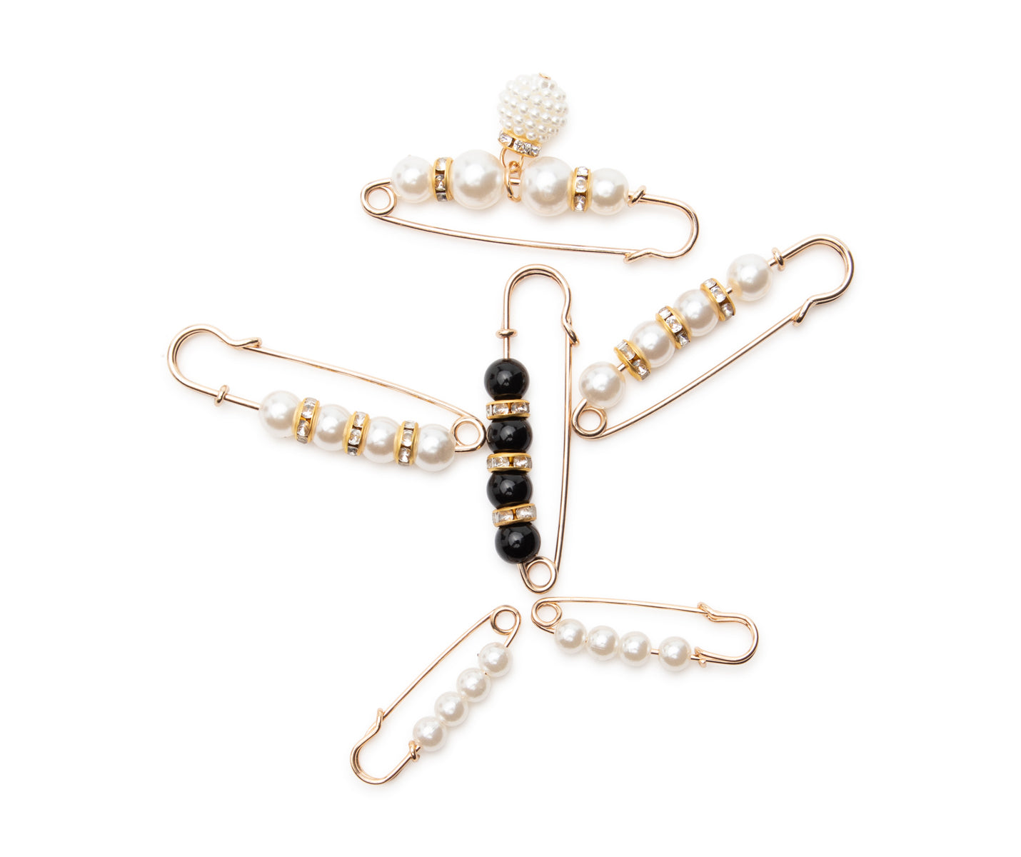 Sechs goldene Sicherheitsnadeln mit Perlen im Set von Dancing Queens, ideales Tanz-Zubehör, sternförmig angeordnet.