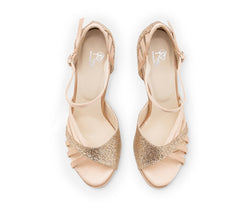 Draufsicht der nackten Tanzschuhe Dancing Queens ESP03 mit glitzernden goldenen Riemen auf weißem Hintergrund.