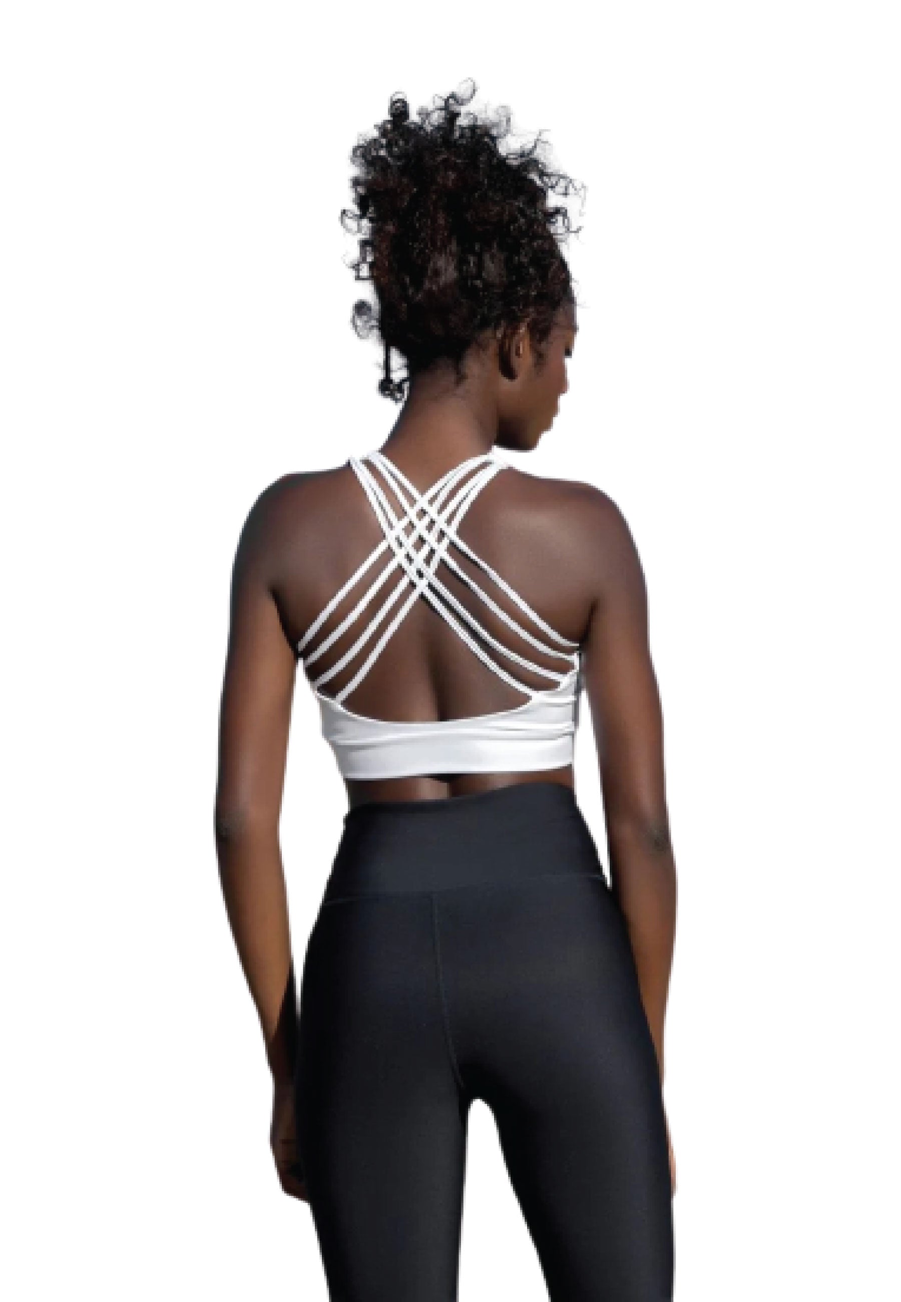 Frau im Lismina 189 Sport-BH in Weiss und schwarzen Leggings, von hinten vor einem weißen Hintergrund betrachtet.