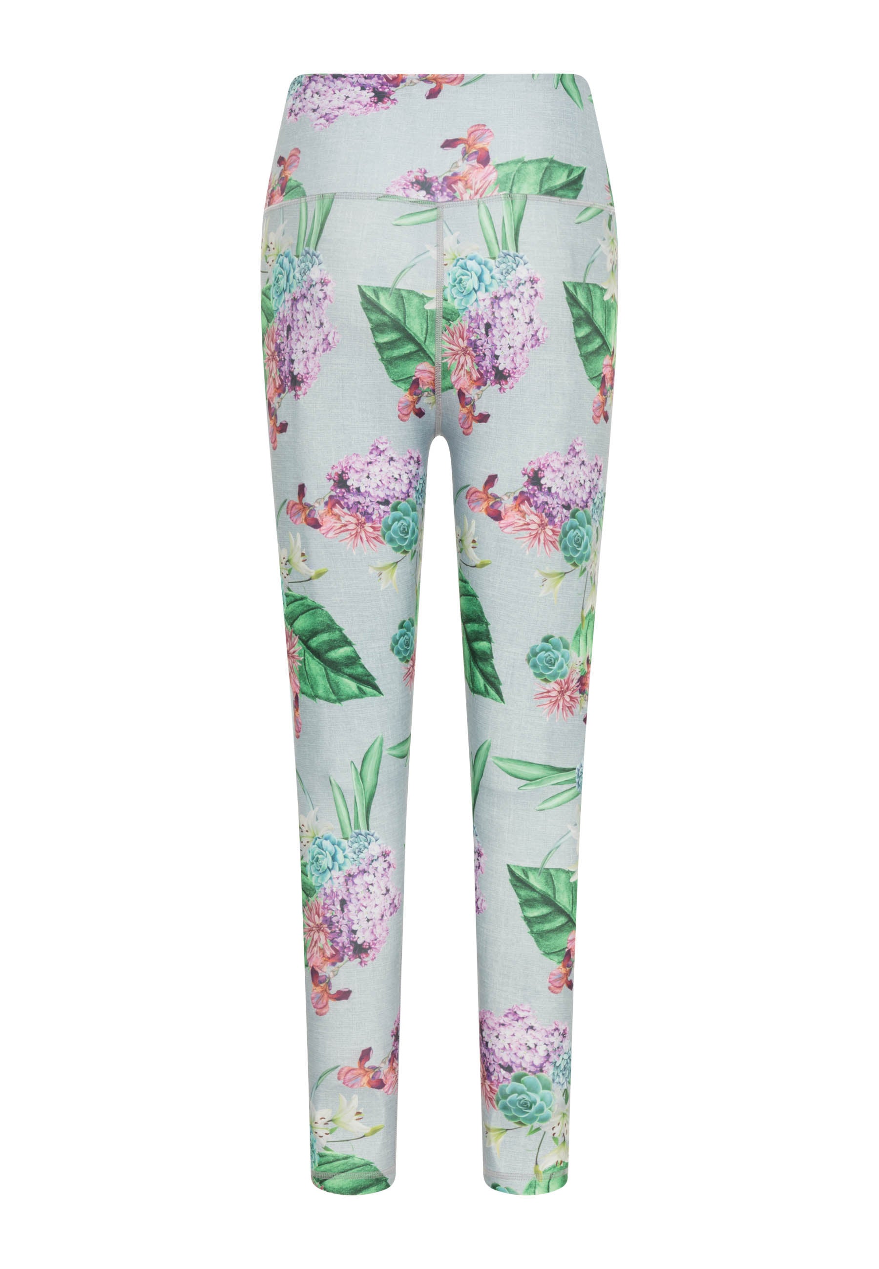 Rückansicht der 1081 Extra High Waist Leggings von Lismina in Grün mit Blumenmuster auf hellblauem Hintergrund.