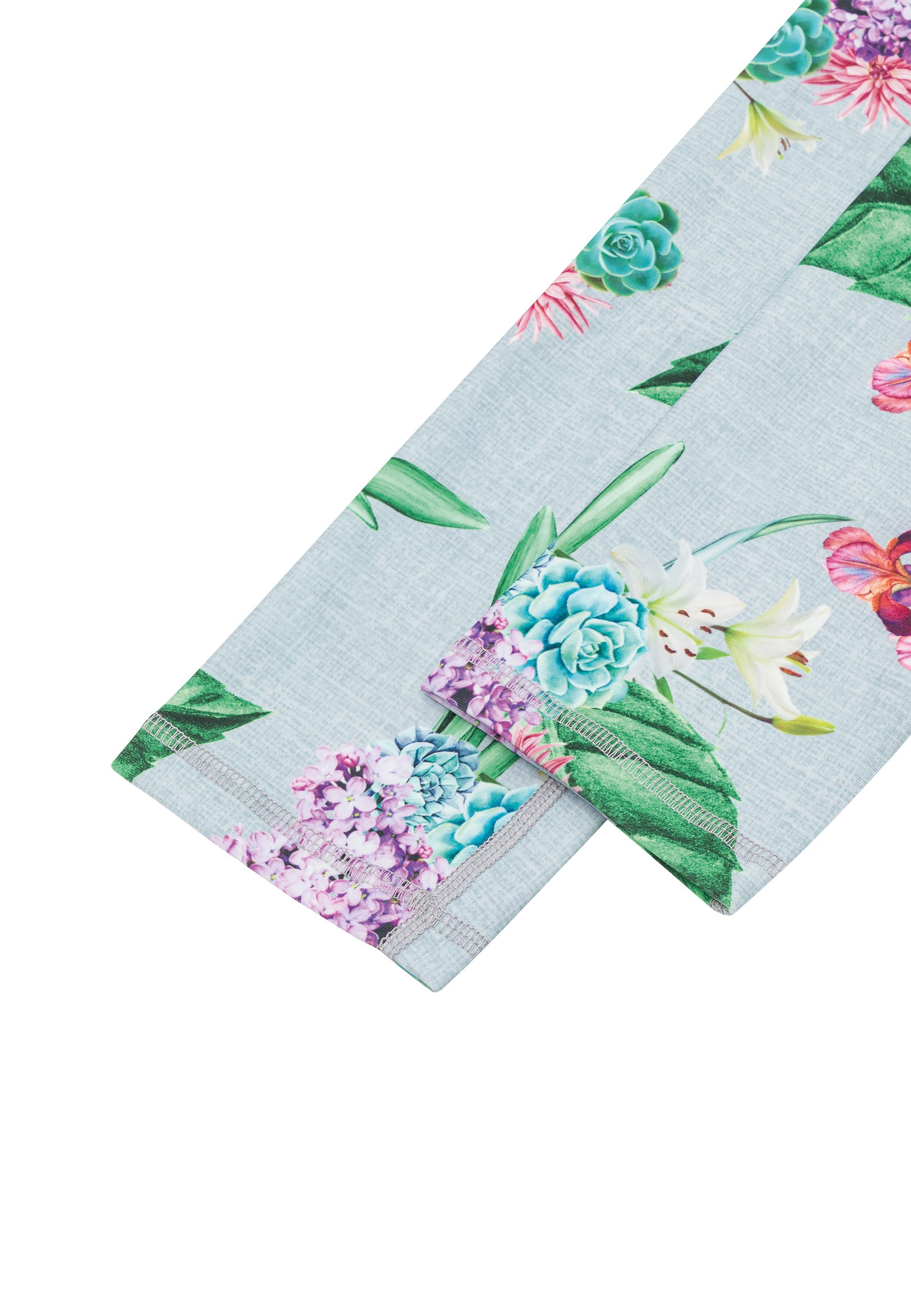 Blumengemusterte Leggings Lismina 1081 mit leuchtenden Blumen auf hellblauem Hintergrund.