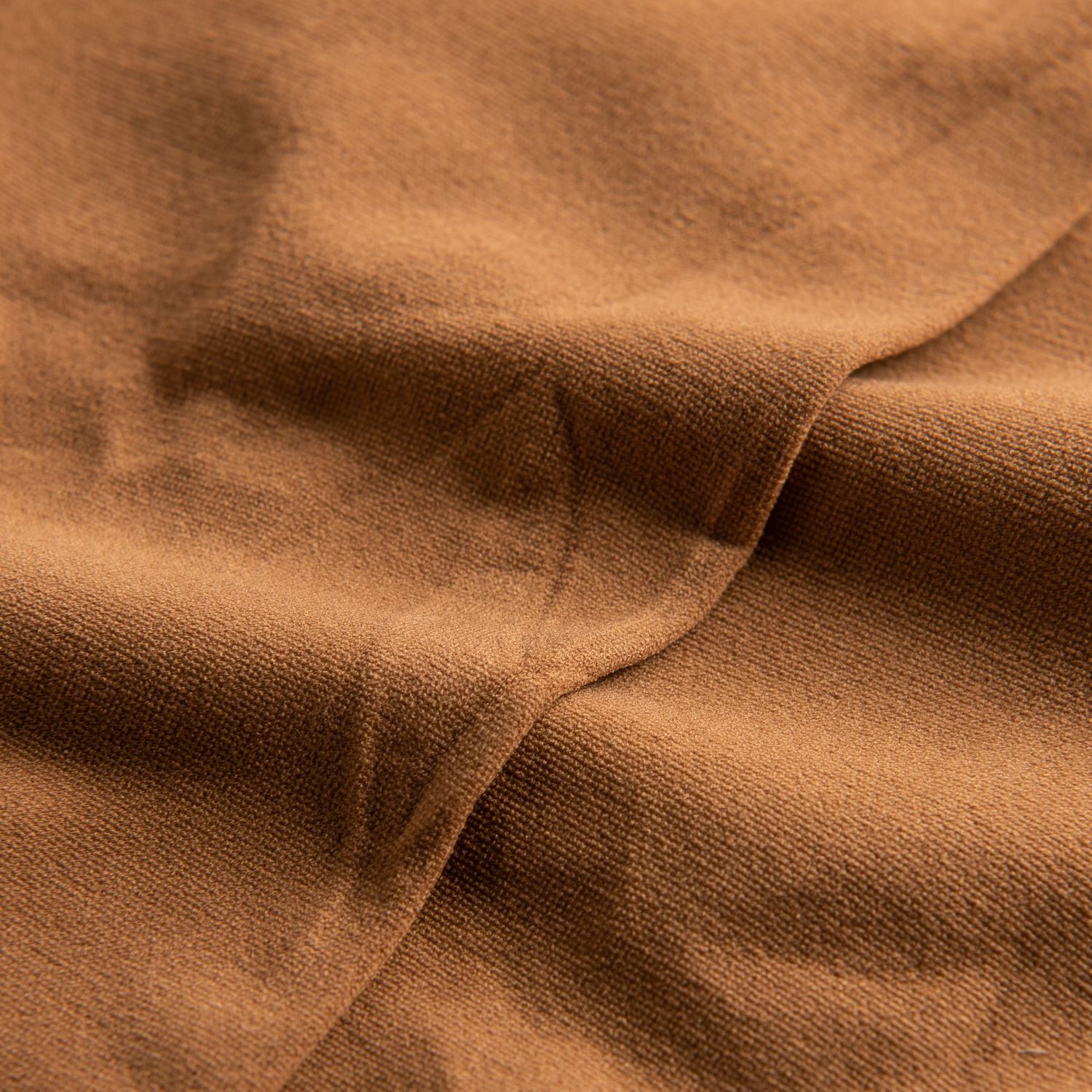 Nahaufnahme der 108 Economy Ballettstrumpfhose in Noix von Rumpf, die ihre subtilen Falten und ihre Textur zeigt.