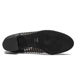 Die Sohle der schwarzen 9235 Damen-Swingschuhe hat eine strukturierte, rutschfeste Oberfläche mit dem Aufdruck „Made in Italy“.